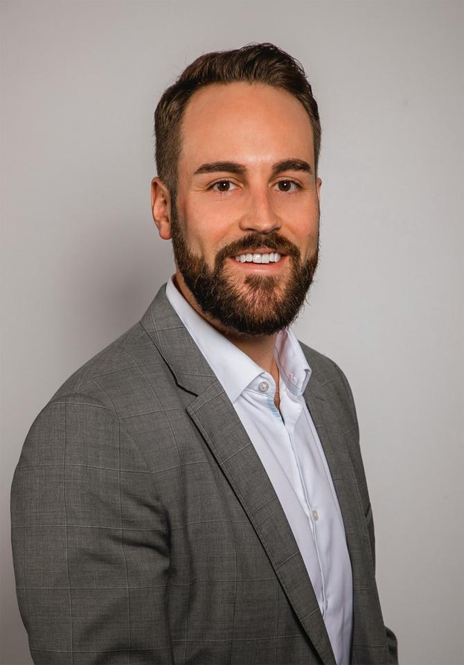 Seitliches Portrait von Julian Wollscheidt, neuer kaufmännischer Geschäftsführer.